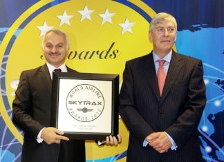 Turkish Airlines’ general manager Temel Kotil Ph.D. (left) receives the award from Skytrax CEO Edward Plaisted (right).